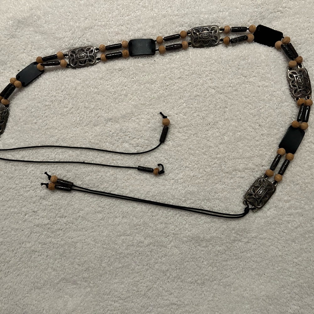 Chicos leather, wood, silver like metal belt.